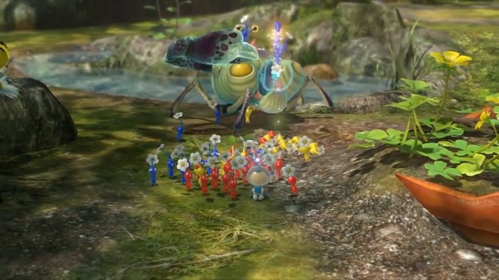 Pikmin 3: Captain Olimar and Pikmin fight a large insectoid creature
