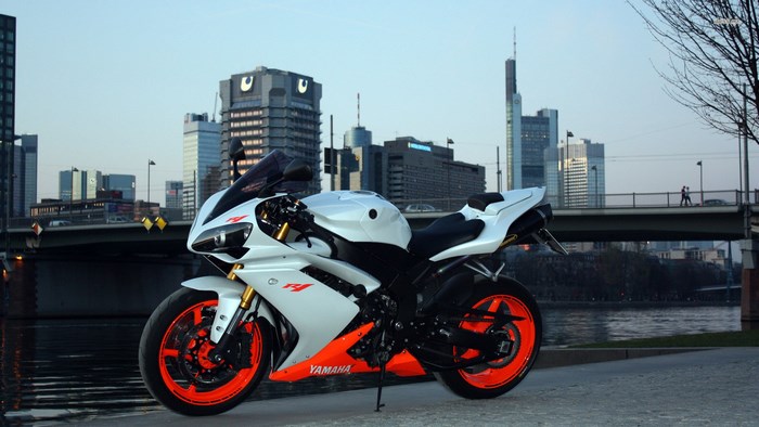 White Yamaha YZF R1 motorcycle with orange rims