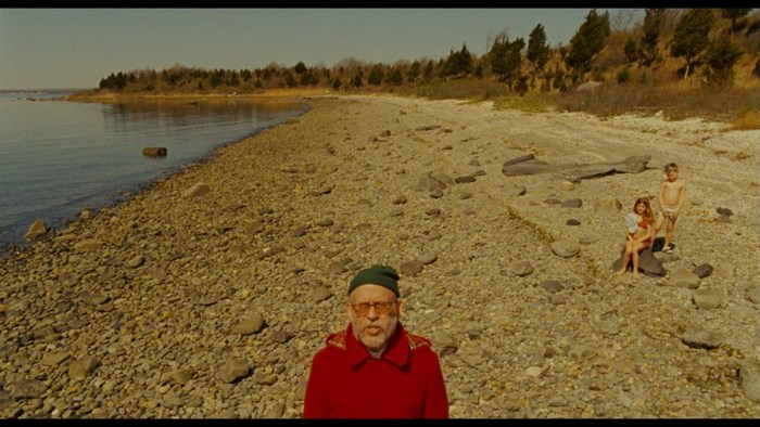 Moonrise Kingdom beach scene with children and man