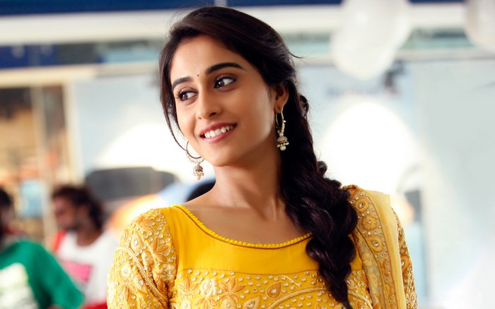 Regina Cassandra in yellow dress