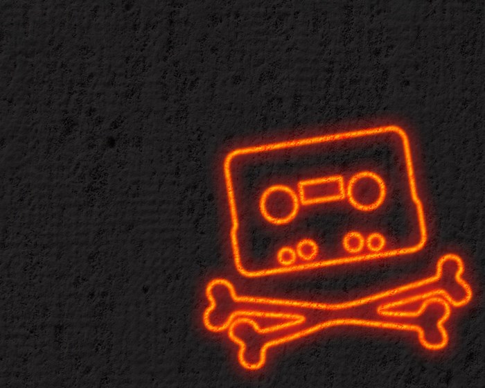 Neon cassette tape and crossbones symbol