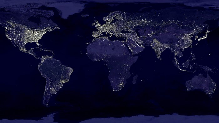World map at night showing city lights from space