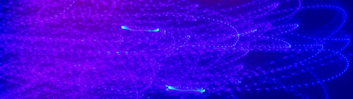 Abstract blue and purple light trails