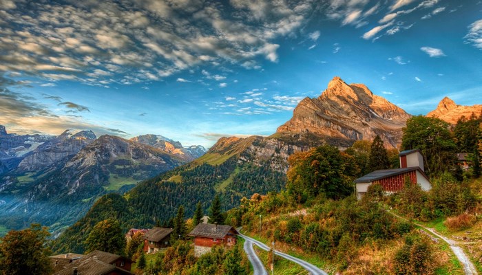 Mountain landscape with houses and trees