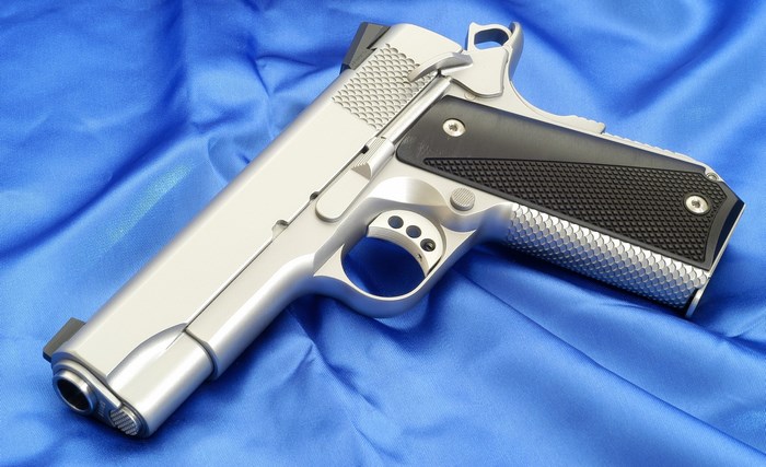 Ed Brown Kobra Carry pistol on blue fabric