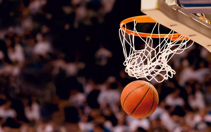 Basketball going through a hoop