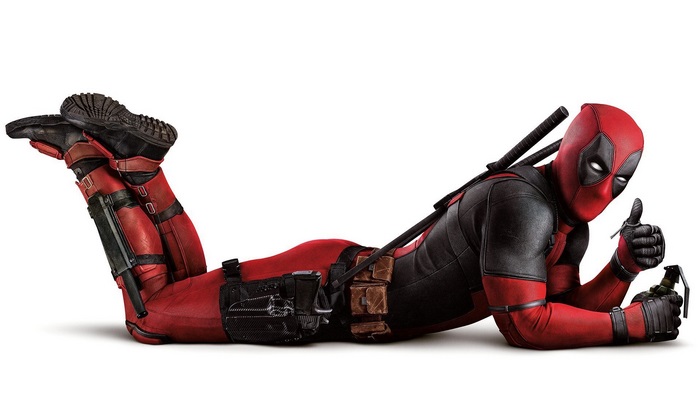 Deadpool holding a grenade and giving a thumbs up
