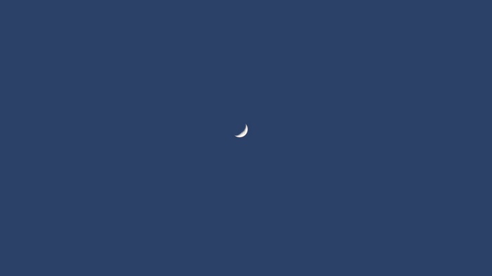 Crescent Moon in Dark Blue Sky