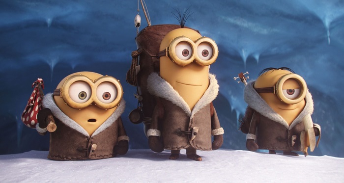 Minions in winter coats in an icy cave