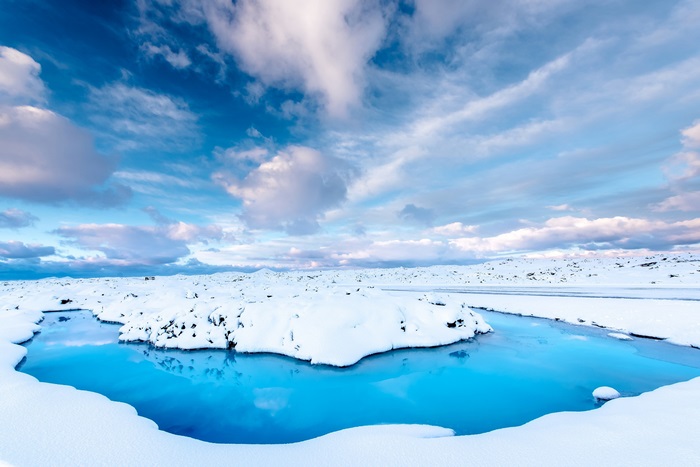 Icelandic Snowy Landscape with Blue Water 4K