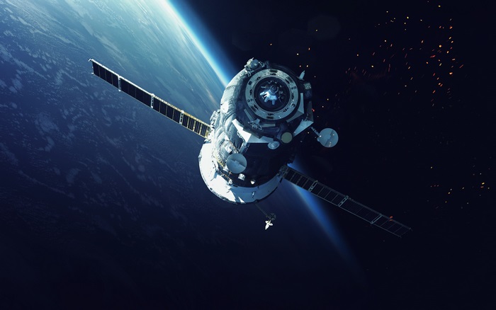 Space satellite orbiting Earth