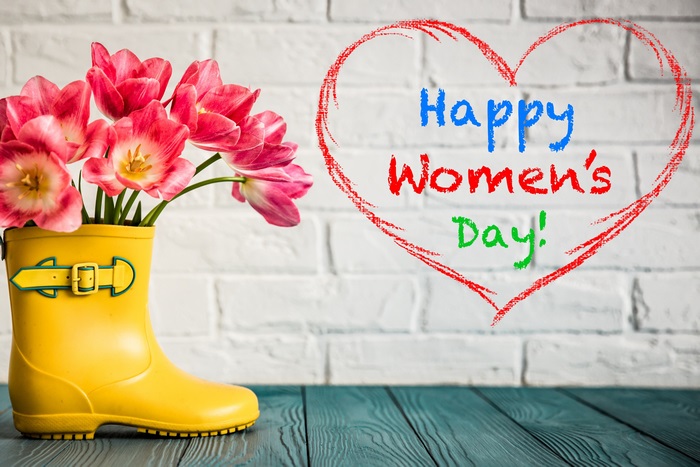 Happy Women's Day tulips in yellow boot 4K