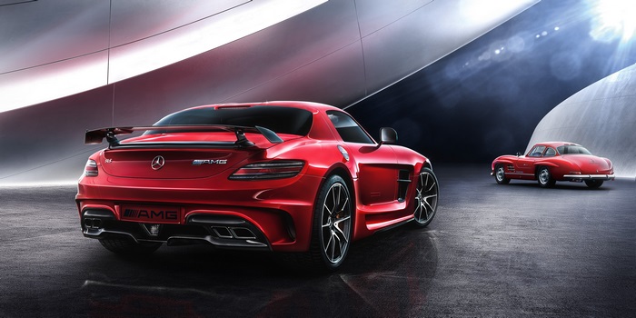 Red Mercedes SLS AMG and Classic Mercedes 300 SL
