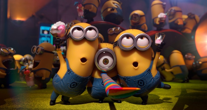 Minions celebrating with drinks and party blower