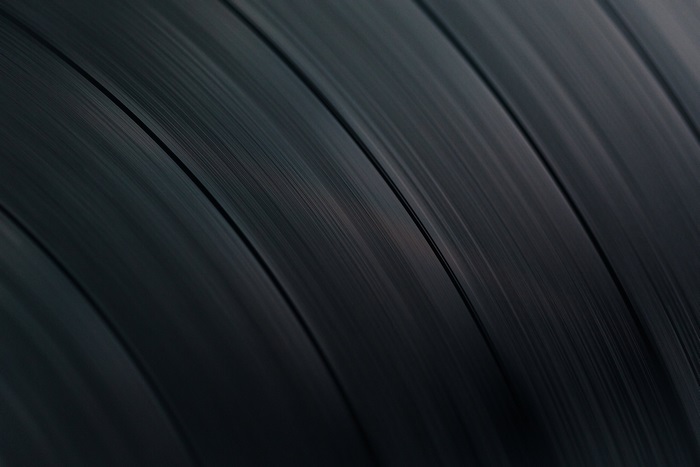 Close-up of Vinyl Record Grooves 4K