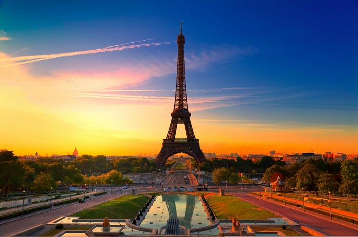 Eiffel Tower at sunset with reflection