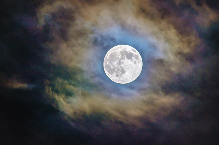 4K Full Moon Through Colorful Clouds