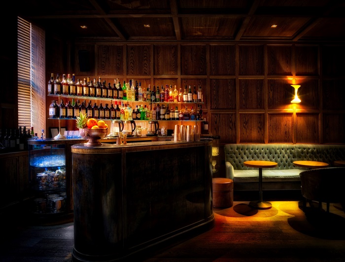 Bar with bottles and seating