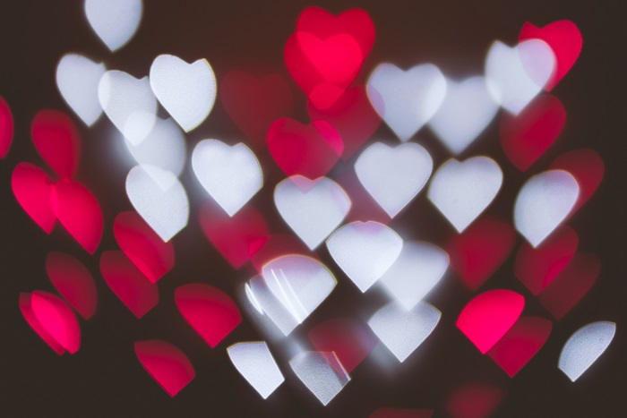 Heart-shaped bokeh lights in red and white