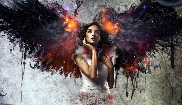 Woman with fiery black wings