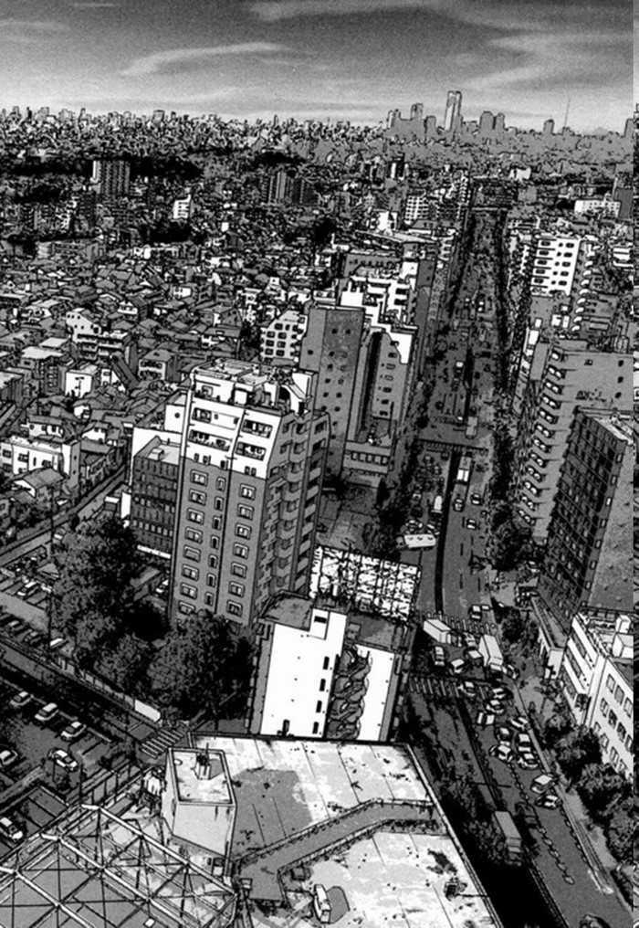 Cityscape with tall buildings and a busy street