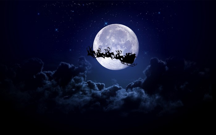 Santa Claus flying in a sleigh with reindeer across the moon