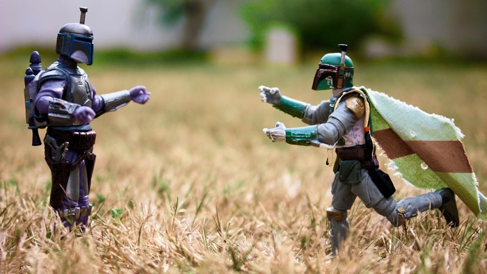 Boba Fett and Jango Fett action figures in grass
