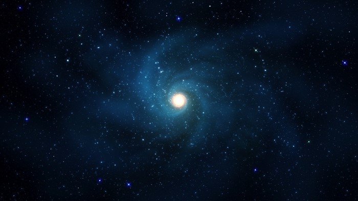 Spiral galaxy with bright center and stars