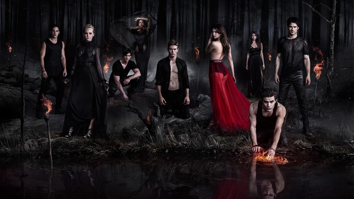 The Vampire Diaries cast in a dark forest