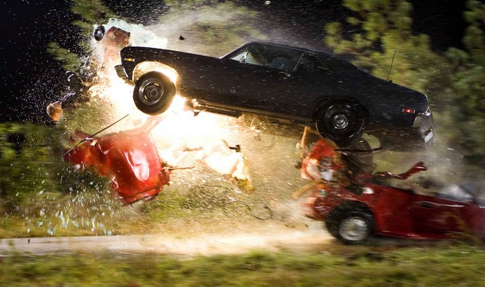 Car crash with explosion and debris