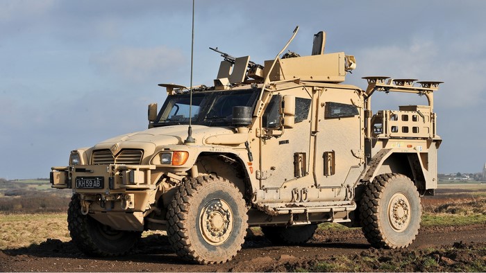 Military MRAP vehicle with machine gun mount