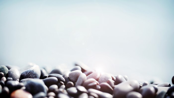 Pebbles on a beach with shallow depth of field