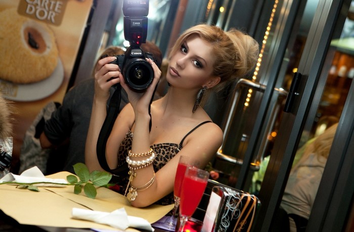 Blonde Woman Taking Self-Portrait with Canon Camera