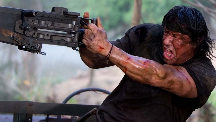 John Rambo from Rambo firing a machine gun