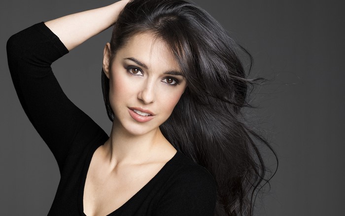 Cristina Brondo with Flowing Dark Hair and Warm Smile