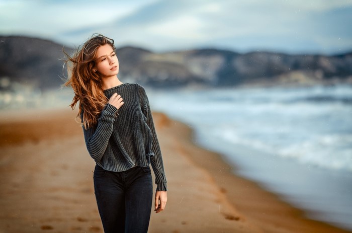 Woman with long hair on a beach