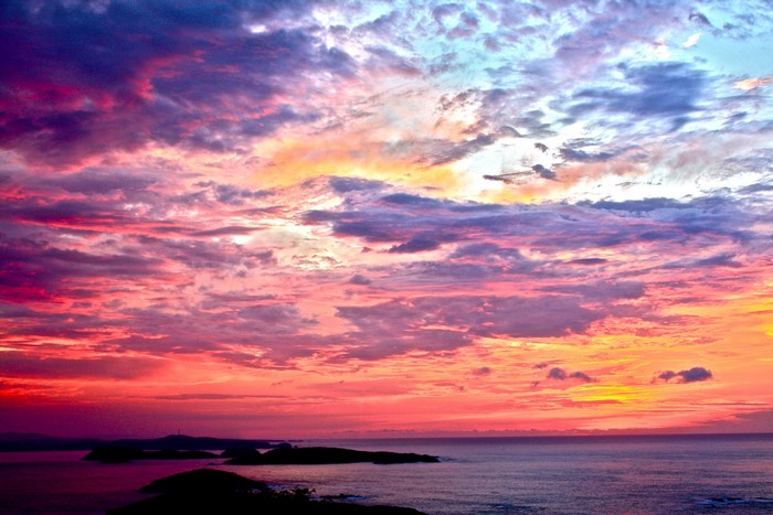 Colorful Sunset Over the Ocean with Islands