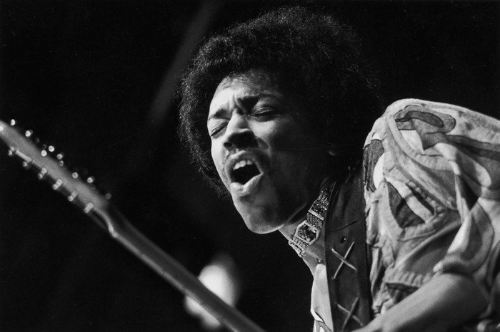 Jimi Hendrix playing guitar