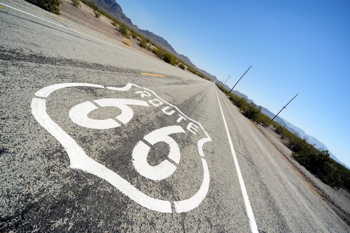 Route 66 road sign painted on asphalt