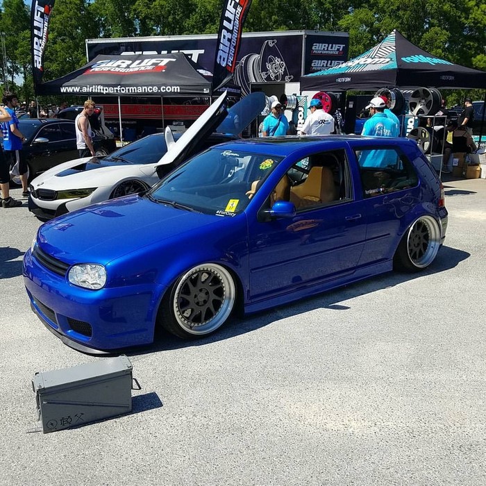 Blue Volkswagen Golf MK4 at Air Lift Performance event