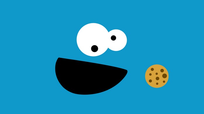 Cookie Monster from Sesame Street with a cookie