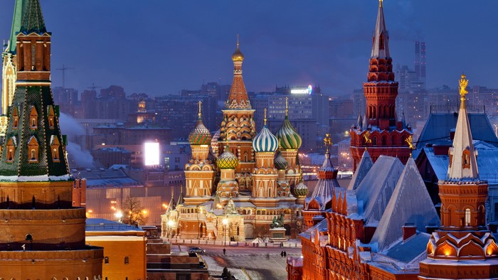 Saint Basil's Cathedral and Kremlin towers in Moscow at dusk