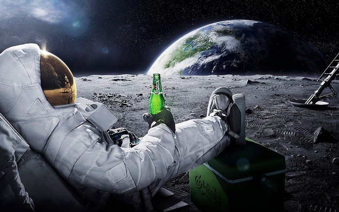 Astronaut drinking Carlsberg on the Moon with Earth in background