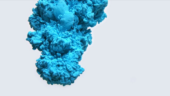 Blue ink clouds in slow motion