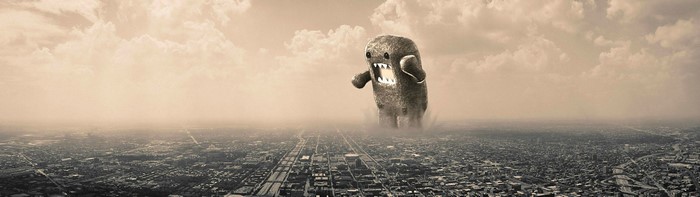 Domo-kun monster over a misty cityscape