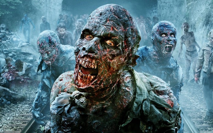 A horde of terrifying zombies in a dark, foggy environment