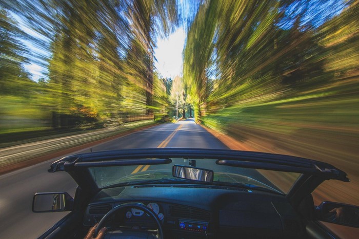 Driving through a forest with motion blur