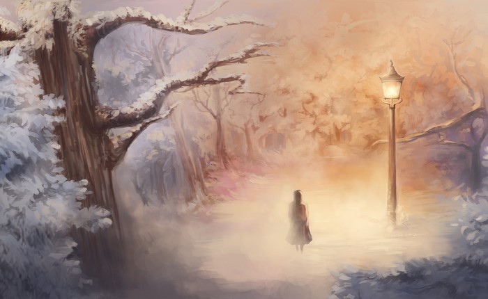 Girl walking by a lantern in a snowy forest