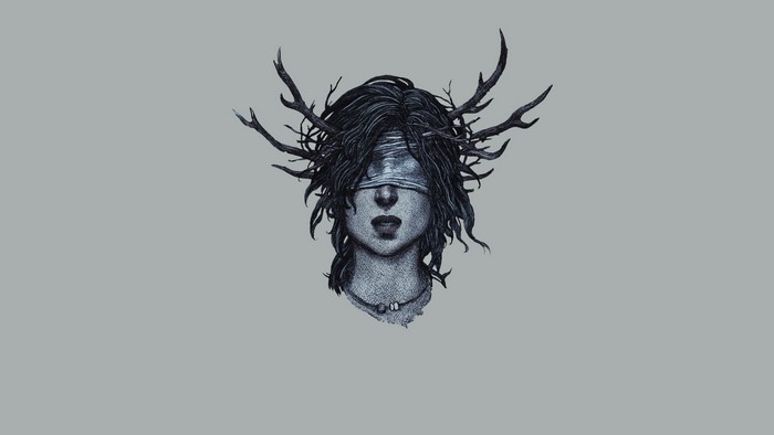 Woman with blindfold and branches in hair