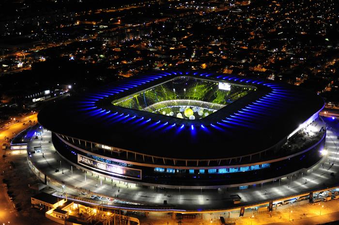 Arena do Grêmio at night with blue lights